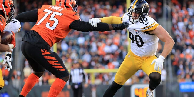 Pittsburgh Steelers outside linebacker T.J. Watt (90) battles Cincinnati Bengals offensive tackle Isaiah Prince (75) as he tries to rush the passer during the second half of an NFL football game, Sunday, Nov. 28, 2021, in Cincinnati.