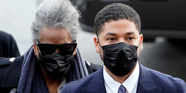 Actor Jussie Smollett arrives with his mother Monday, Nov. 29, 2021, at the Leighton Criminal Courthouse for jury selection at his trial in Chicago. 