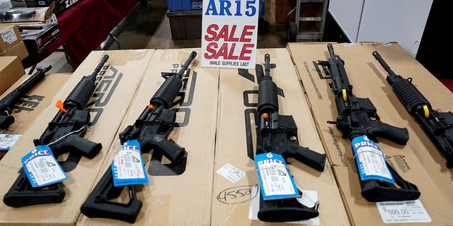 FILE -- AR-15 rifles are displayed for sale at the Guntoberfest gun show in Oaks, Pennsylvania, U.S., October 6, 2017. REUTERS/Joshua Roberts/File Photo