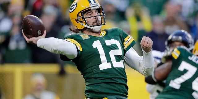 Green Bay Packers' Aaron Rodgers thorws during the first half of an NFL football game against the Seattle Seahawks Sunday, Nov. 14, 2021, in Green Bay, Wis.