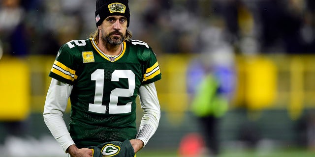 Aaron Rodgers #12 of the Green Bay Packers walks off the field after defeating the Seattle Seahawks 17-0 at Lambeau Field in Green Bay, Wisconsin, Nov.. 14, 2021.