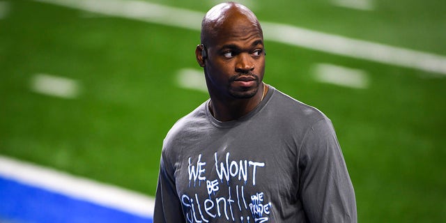 DETROIT, MI - NOVEMBER 15: Adrian Peterson #28 of the Detroit Lions looks on before the game against the Washington Football Team at Ford Field on November 15, 2020 in Detroit, Michigan.