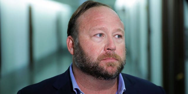 WASHINGTON, DC - SEPTEMBER 5: Alex Jones of InfoWars talks to reporters outside a Senate Intelligence Committee hearing concerning foreign influence operations' use of social media platforms, on Capitol Hill, September 5, 2018 in Washington, DC. Twitter CEO Jack Dorsey and Facebook chief operating officer Sheryl Sandberg faced questions about how foreign operatives use their platforms in attempts to influence and manipulate public opinion. (Photo by Drew Angerer/Getty Images)