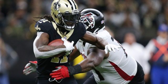 Alvin Kamara (41) of the New Orleans Saints runs the ball during the fourth quarter in the game against the Atlanta Falcons at Caesars Superdome on Nov. 7, 2021, in New Orleans, Louisiana.