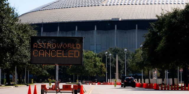 A street sign showing the cancellation of the AstroWorld Festival at NRG Park on November 6, 2021 in Houston, Texas. According to authorities, eight people died and 17 people were transported to local hospitals after what they describe as a crowd surge at the Astroworld festival, a music festival started by Houston-native rapper and musician Travis Scott in 2018.