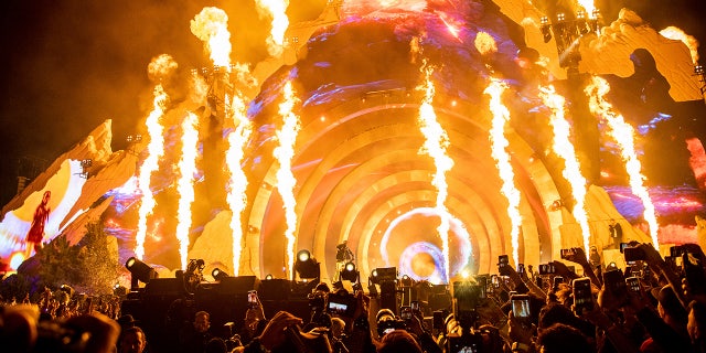 Travis Scott performs at Day 1 of the Astroworld Music Festival at NRG Park on Friday, Nov. 5, 2021, in Houston. Concertgoers described mounting anticipation for the headline rapper that led people to push toward the stage.