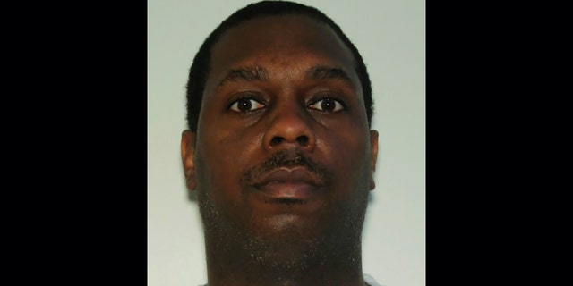 Kenny Wells, 42, a convicted felon, was being sought in connection with Saturday's gunfire at Hartsfield-Jackson Atlanta International Airport, authorities said. (Atlanta Police Department via Associated Press)