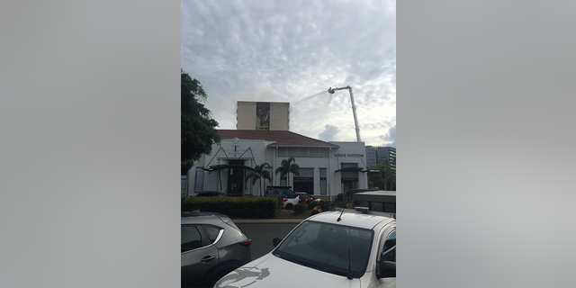 A fire is being extinguished at the Pacific Hotel, a COVID-19 quarantine venue, in Cairns, Australia Nov. 28, 2021 in this picture obtained from social media.