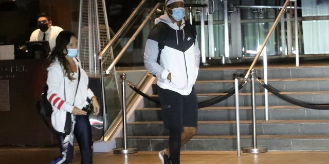 Golf superstar Tiger Woods arrives in Los Angeles on Sunday night. Woods was seen walking towards the hotel without the help of crutches for the first time since he was involved in a car accident near Los Angeles in February, resulting in a 15-time winner breaking his leg and a long road to recovery.