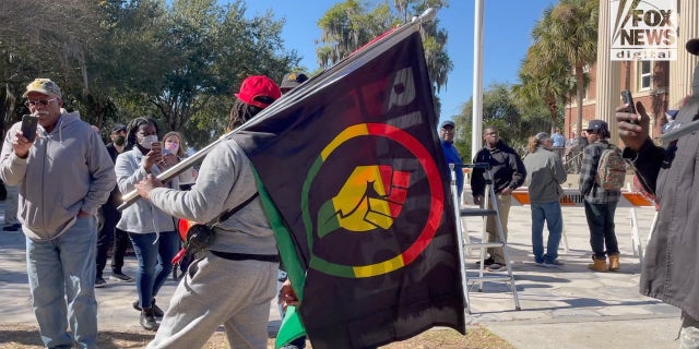 Michael Harris protests in front of Glenn County Courthouse