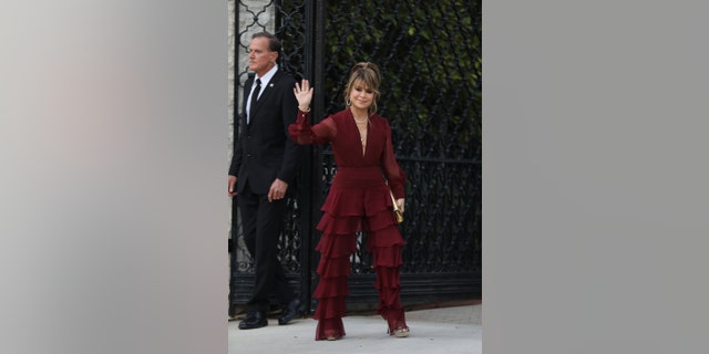 Paula Abdul rocked a wine-hued ruffled jumpsuit that she paired with gold jewelry.