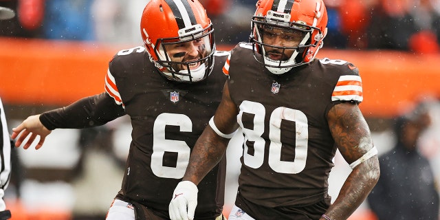 Cleveland Browns quarterback Baker Mayfield (6) congratulates wide receiver Jarvis Landry (80) after Landry scored a 16-yard touchdown against the Detroit Lions Nov. 21, 2021, in Cleveland.