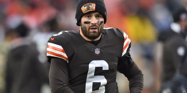 Cleveland Browns quarterback Baker Mayfield walks to the locker room after the Browns defeated the Detroit Lions 13-10 in an NFL football game, Sunday, Nov. 21, 2021, in Cleveland.