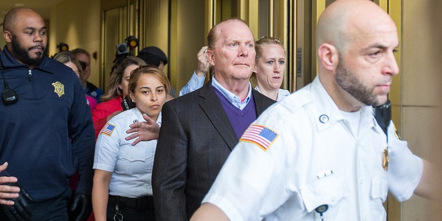 Celebrity chef Mario Batali leaves Boston Municipal Court following an arraignment on a charge of indecent assault and battery in connection with a 2017 incident at a Back Bay restaurant on May 24, 2019, in Boston, Massachusetts.  