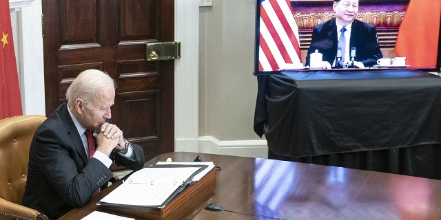 President Biden listens while meeting virtually with Xi Jinping, China's president, in the Roosevelt Room of the White House in Washington, D.C., on Monday, Nov. 15, 2021. 