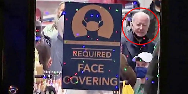 Biden spotted without mask in store that requires masks