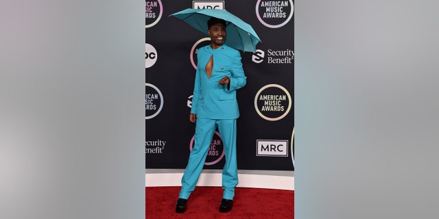 Billy Porter arrives at the American Music Awards on Sunday, Nov. 21, 2021, at Microsoft Theater in Los Angeles. 