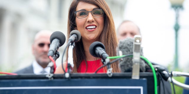 US Representative Lauren Boebert, Republican of Colorado, alongside members of the House Freedom Caucus, calls on senior administration officials, including US President Joe Biden, to resign or be impeached over the handling of the US military withdrawal from Afghanistan, during a press conference outside of the US Capitol in Washington, DC August 31, 2021. (Photo by SAUL LOEB / AFP) (Photo by SAUL LOEB/AFP via Getty Images)