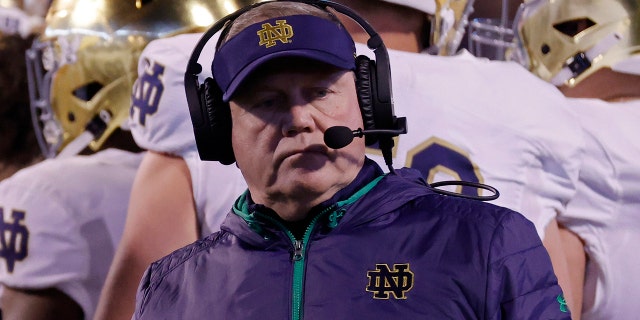 Notre Dame Fighting Irish head coach Brian Kelly looks on against the Virginia Cavaliers during the second quarter at Scott Stadium Nov. 13, 2021, in Charlottesville, Virginia.