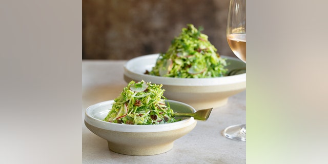 Brussels Sprout Slaw with Raisins and Dill by Shilpi and Etienne Karner of between2kitchens.com. (between2kitchens)