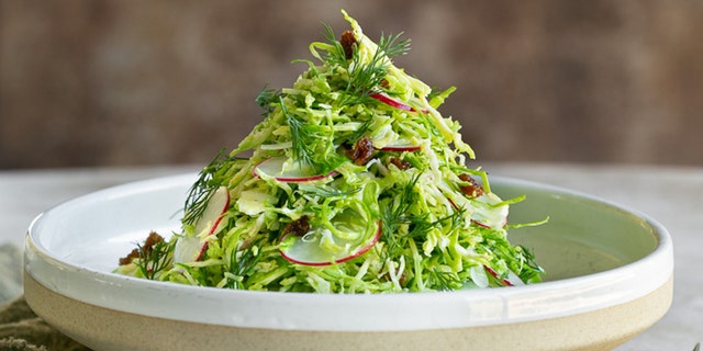 Brussels Sprout Slaw with Raisins and Dill by Shilpi and Etienne Karner of between2kitchens.com. (between2kitchens)