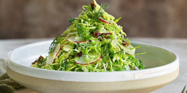 Brussels Sprout Slaw with Raisins and Dill by Shilpi and Etienne Karner of between2kitchens.com. (between2kitchens)