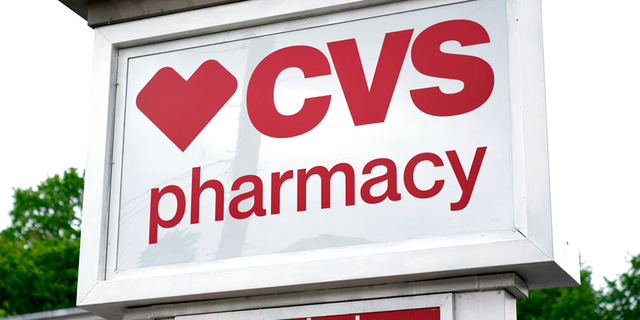 This is a CVS Pharmacy sign is shown in Mount Lebanon, Pa., on Monday May 3, 2021. 