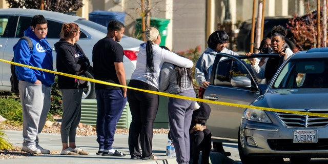 A Los Angeles County Sheriff's Department statement says deputies found a woman, a girl and three boys with gunshot wounds and paramedics pronounced them dead at the scene. (AP Photo/Ringo H.W. Chiu)