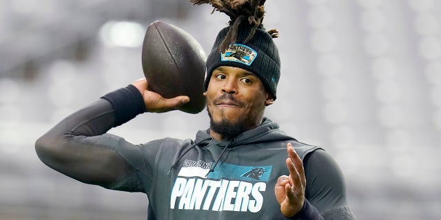Cam Newton Draws Scorn on Social Media after Remarking How Women Need to Know “How to Cater to a Man’s Needs” 3 Carolina Panthers quarterback Cam Newton warms up before the Cardinals game Nov. 14, 2021, in Glendale, Arizona.