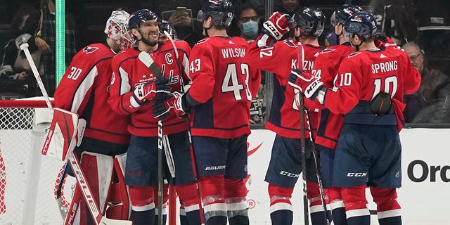 Washington Capitals celebrate a 2-0 win over the Los Angeles Kings after their NHL hockey game Wednesday, Nov. 17, 2021, in Los Angeles. 