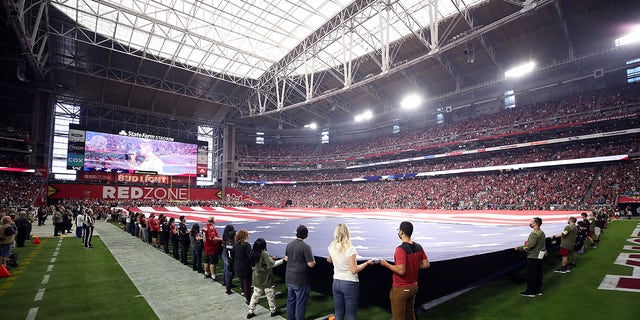 GLENDALE, ARIZONA - NOVEMBER 14: A general view during the singing of the national anthem before the game between the Carolina Panthers and the Arizona Cardinals at State Farm Stadium on November 14, 2021 in Glendale, Arizona.