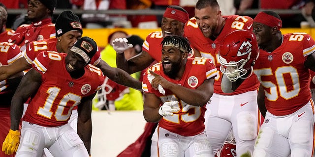 Members of the Kansas City Chiefs celebrate late in the second half of an NFL football game against the Dallas Cowboys on Sunday, November 21, 2021 in Kansas City, Mo.