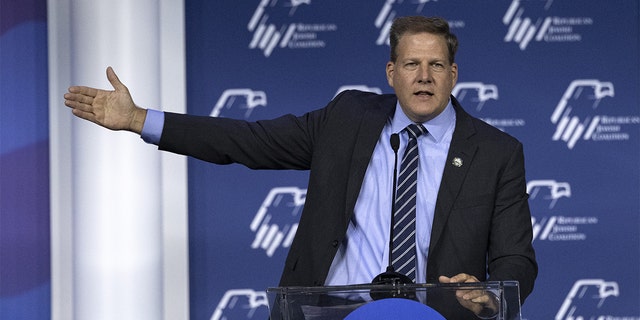 New Hampshire Governor Chris Sununu gestures as he speaks during the Republican Jewish Coalition (RJC) annual leadership meeting in Las Vegas on Friday, November 5, 2021.  Photographer: Bridget Bennett / Bloomberg via Getty Images