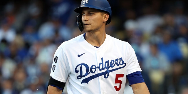 Corey Seager of the Los Angeles Dodgers strikes out during the seventh inning of Game 3 of the National League Championship Series against the Atlanta Braves at Dodger Stadium on Oct. 19, 2021, a Los Angeles, California.