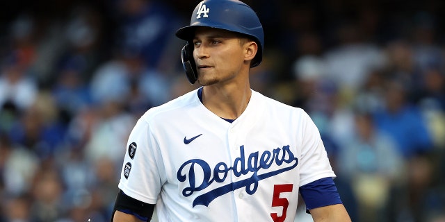 Corey Seager of the Los Angeles Dodgers strikes out during the seventh inning of Game 3 of the National League Championship Series against the Atlanta Braves at Dodger Stadium on Oct. 19, 2021, in Los Angeles, California.