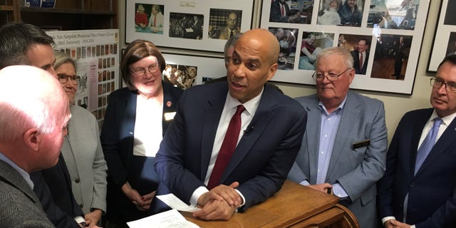 Sen. Cory Booker of New Jersey files to put his name of the New Hampshire presidential primary's Democratic ballot, in Concord, New Hampshire, on Nov. 15, 2019.