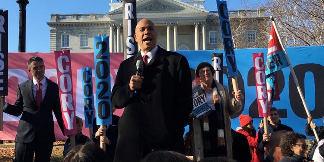 Sen. Cory Booker of New Jersey holds a campaign rally outside the New Hampshire state house as he runs for the Democratic presidential nomination, in Concord, New Hampshire, on Nov. 15, 2019.