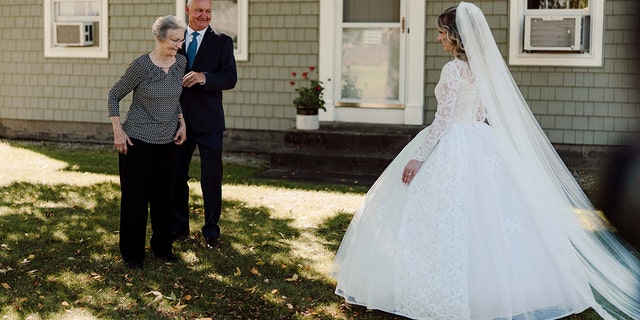 Allie Livingwater wore her grandmother’s wedding dress when she was married on Sept. 25. (@keptyaphotography)