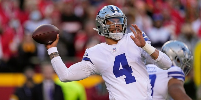 Dallas Cowboys quarterback Dak Prescott throws during the first half of an NFL football game against the Kansas City Chiefs Sunday, Nov. 21, 2021, in Kansas City, Mo.