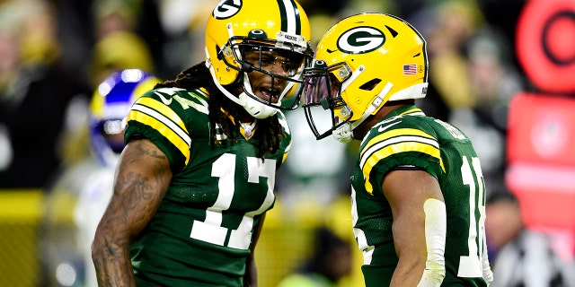 Randall Cobb #18 of the Green Bay Packers celebrates his touchdown catch with Davante Adams #17 during the second quarter against the Los Angeles Rams at Lambeau Field on November 28, 2021 in Green Bay, Wisconsin.