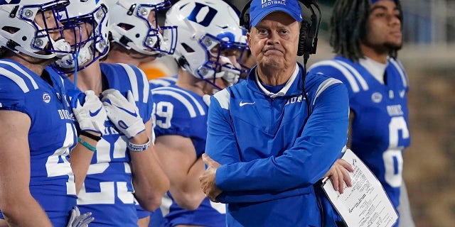 Duke head coach David Cutcliffe walks the sidelines during the second half of an NCAA college football game against Louisville in Durham, N.C., Thursday, Nov. 18, 2021.