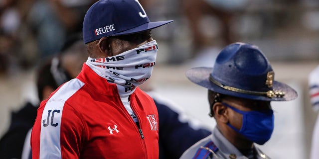 Head Coach Deion Sanders of the Jackson State Tigers walks off the field after the game against the Alabama State Hornets at New ASU Stadium on March 20, 2021 in Montgomery, Alabama. Alabama State Hornets defeated the Jackson State Tigers 35 to 28.