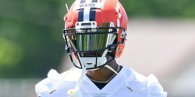 Cornerback Denzel Ward #21 of the Cleveland Browns walks to sideline during a mini camp at the Cleveland Browns training facility on June 16, 2021 in Berea, Ohio.