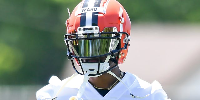 Cornerback Denzel Ward #21 of the Cleveland Browns walks to sideline during a mini camp at the Cleveland Browns training facility on June 16, 2021 in Berea, Ohio.