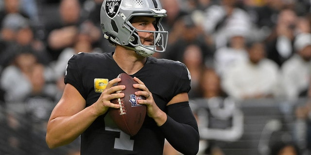 Raiders quarterback Derek Carr looks to pass against the Cincinnati Bengals, Nov. 21, 2021, in Las Vegas.