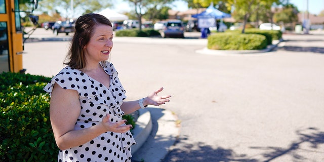 Dorene Ocamb of the Armed Services YMCA speaks at a food distribution on Oct. 28 in San Diego.