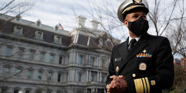 U.S. Surgeon General Jerome Adams takes questions from news reporters outside of the West Wing at the White House in Washington, D.C., Dec. 21, 2020.