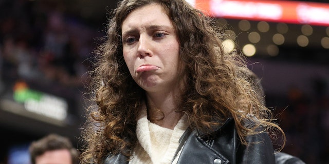 An unidentified fan is removed from the arena following a disturbance involving LeBron James of the Los Angeles Lakers during the game against the Indiana Pacers at Gainbridge Fieldhouse on Nov. 24, 2021, in Indianapolis, Indiana.