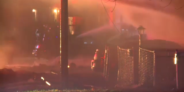 Firefighters are seen responding to a blaze in Flint, Michigan, Nov. 22, 2021. (FOX 66)