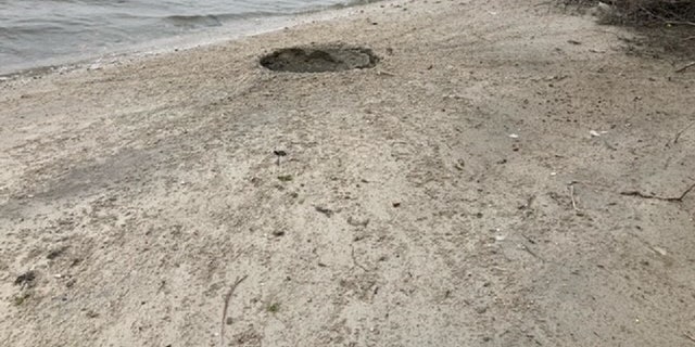 An explosion on Fox Island in New York left a crater